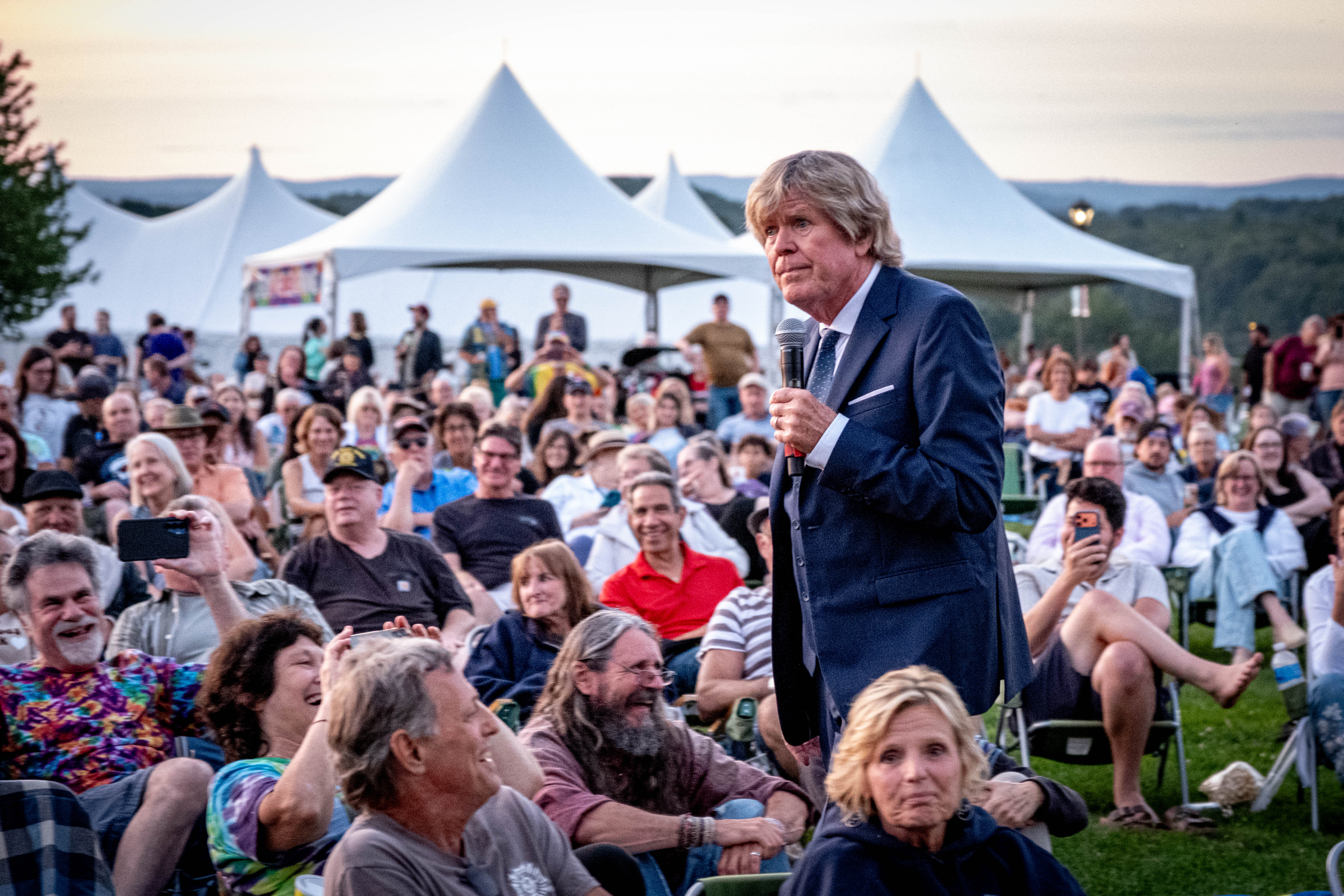 Herman's Hermits' Peter Noone walks through the crowd at Bethel Woods Center for the Arts' 20th anniversary celebration on Friday, July 24.