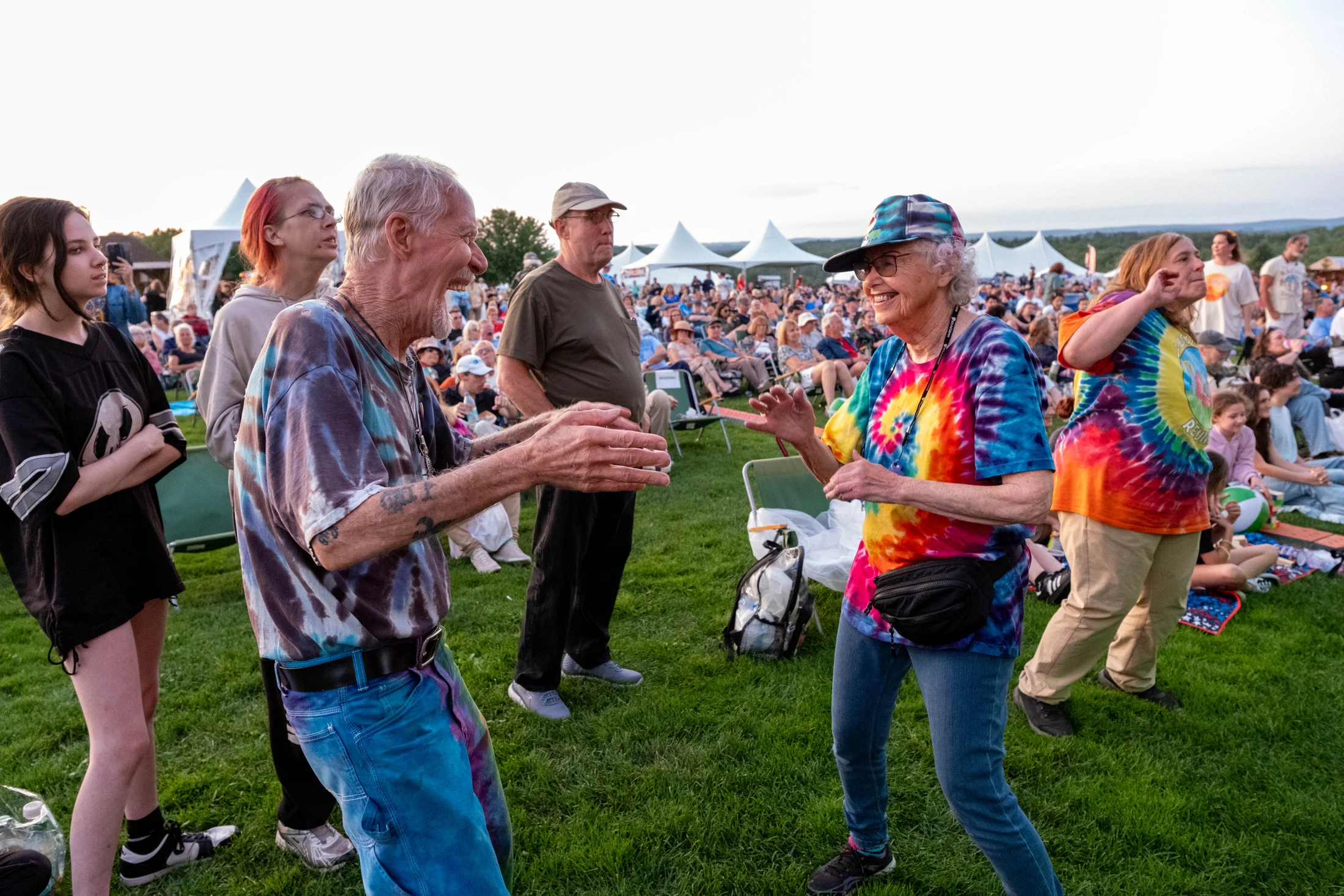 Concertgoers dance on the lawn at Bethel Woods.