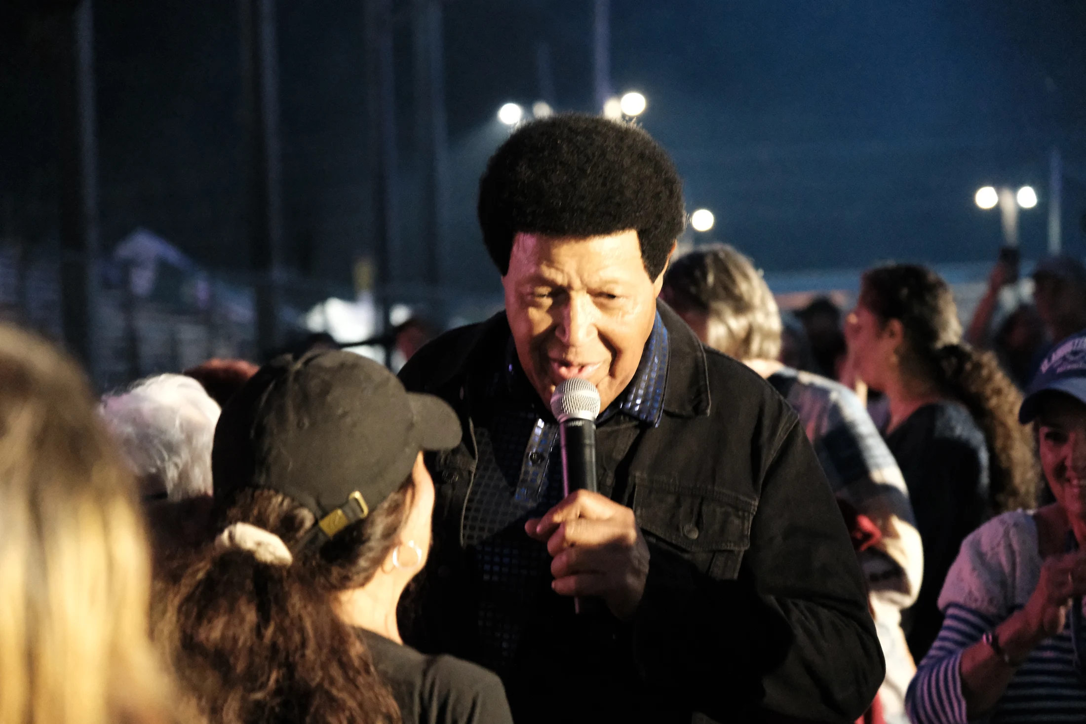 Chubby Checker performs among the crowd during his evening concert at the Delaware County Fair.