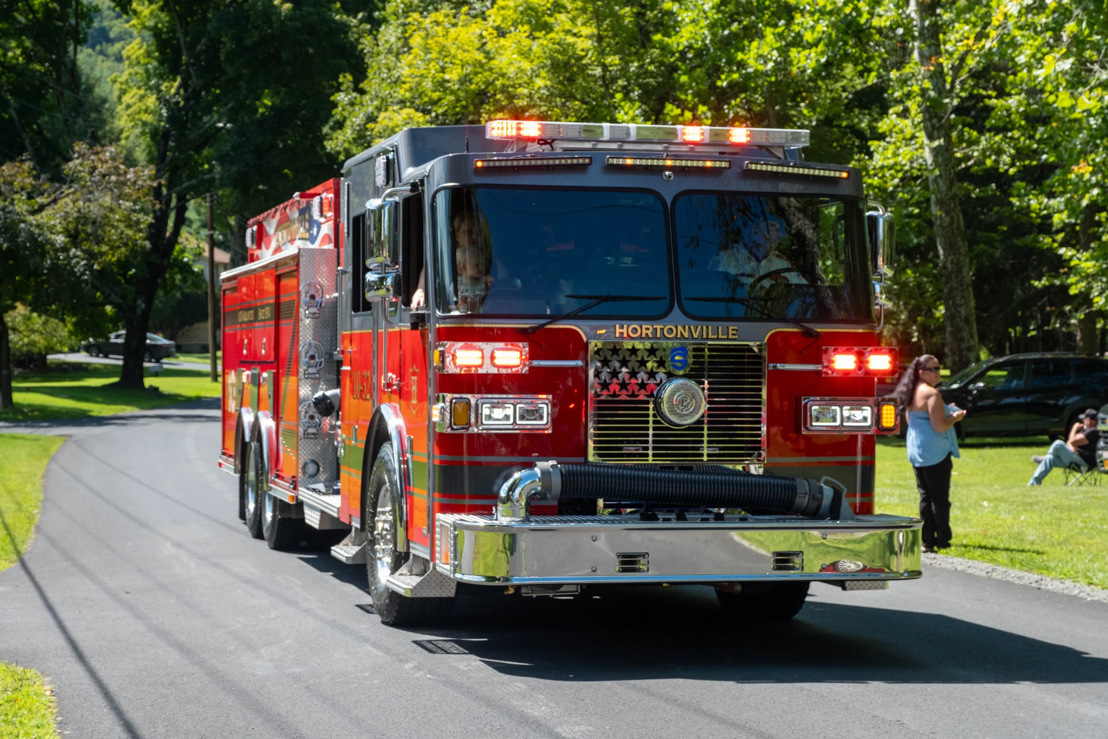 A Hortonville fire engine travels along the parade route.
