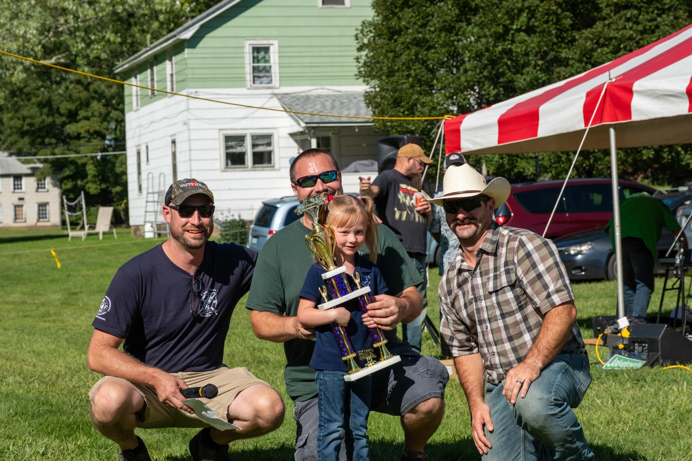 Hortonville fire officers present the best appearing volunteer ambulance corps award during Field Day.