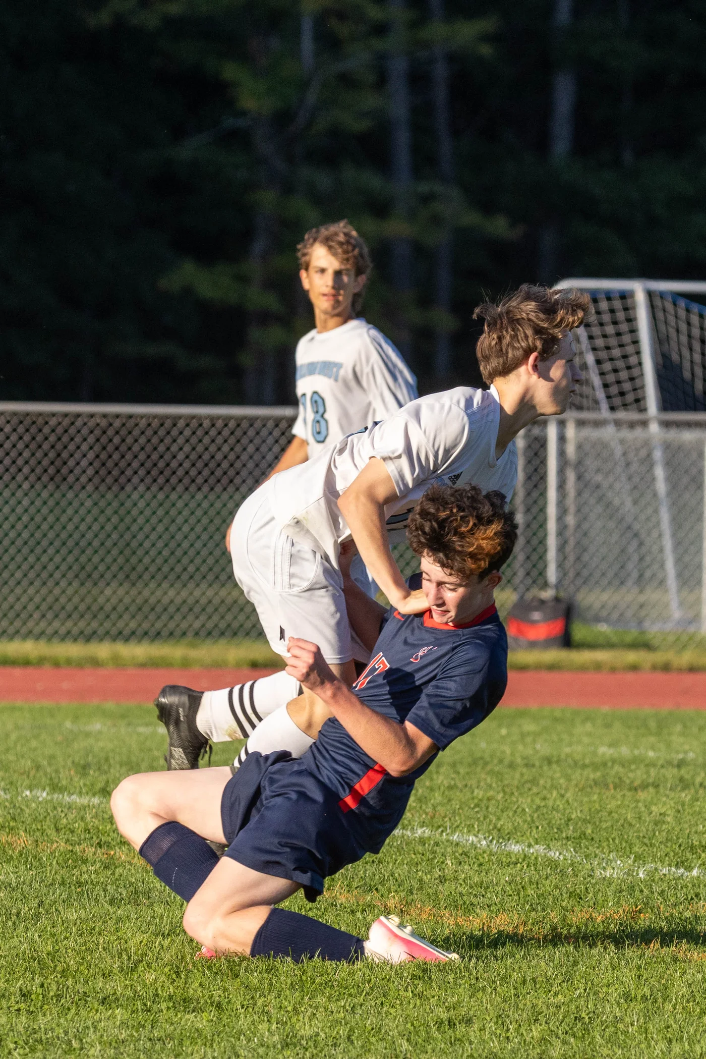 Tri-Valley’s Jayce Hendrickson collides with Dawson Vairo of Sullivan West while advancing towards the goal.